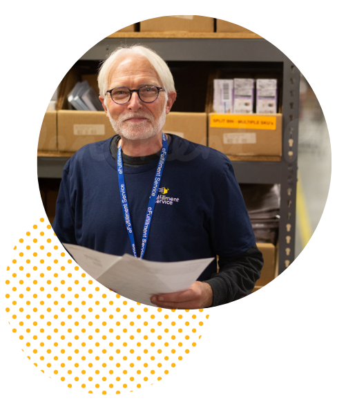 Lite PrepCenter Older Male Employee Holding Order Sheets with 1 Dot