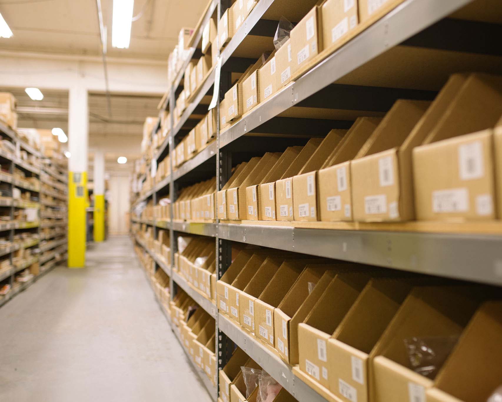 boxes on shelves yellow custom packaging box on blue background