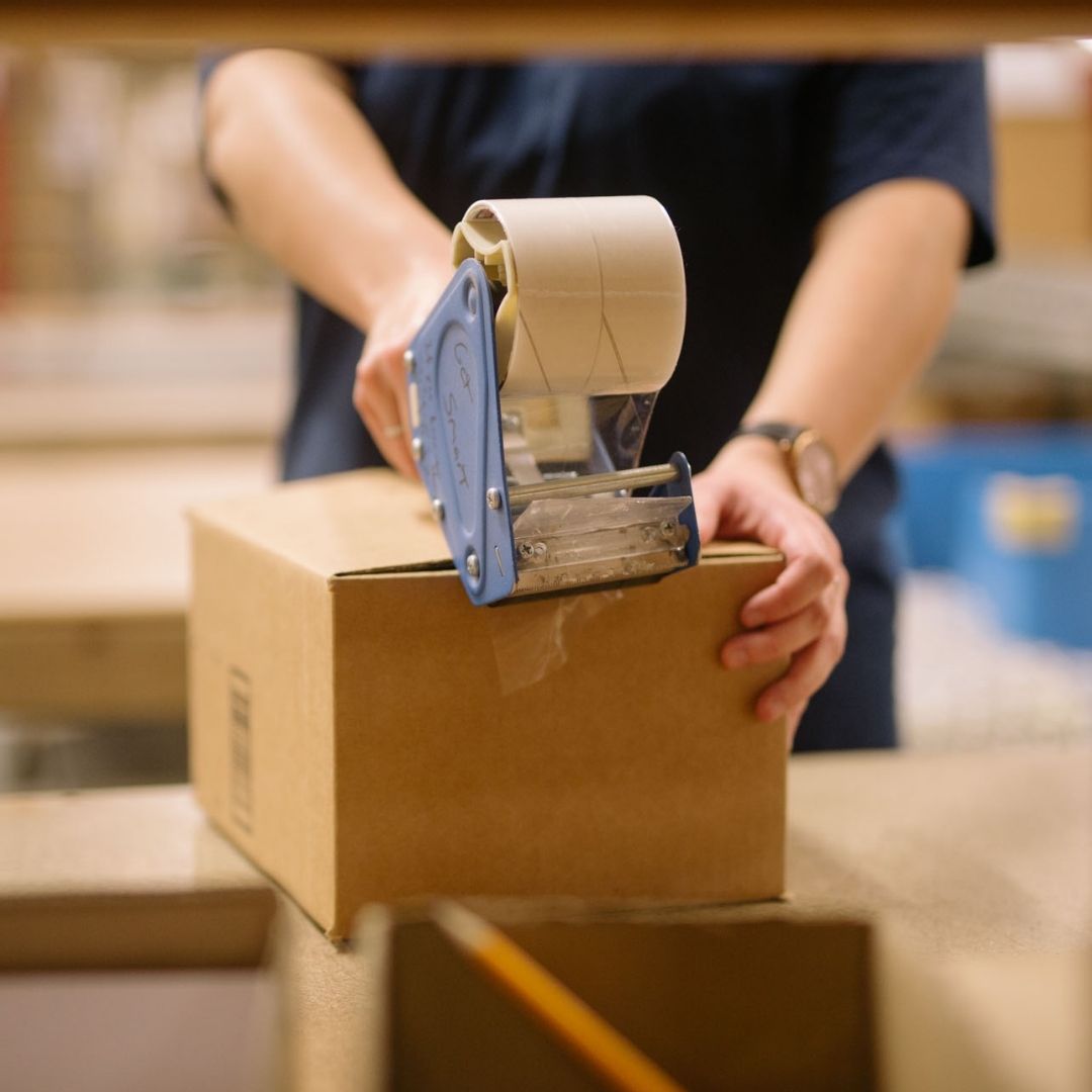 returns processing beauty products in from of custom packaging for fulfillment